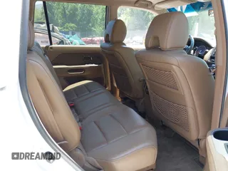2007 Honda Pilot EX-L with VIN 5FNYF18587B000332, listed as a IAAI auction lot 42403191 with 192,771 mi miles and . Bid and sale history available at DreamBid. Image 8.