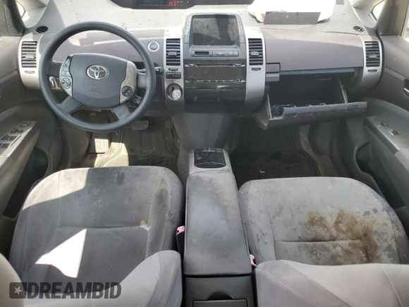 2004 Toyota Prius z VIN JTDKB20UX40033028, wystawiony jako Copart lot #57032515 z przebiegiem 279 143 mil mil oraz Szkoda całkowita • Salvage title. Historia ofert i sprzedaży dostępna na DreamBid. Obrazek 8.
