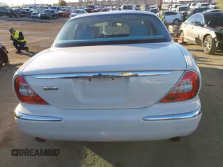 2007 Jaguar XJ with VIN SAJWA71B17SH12746, listed as a IAAI auction lot 41401422 with 99,735 mi miles. Bid and sale history available at carsss.com. Image 16.