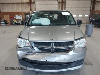 2019 Dodge Grand Caravan SE with VIN 2C4RDGBG3KR571537, listed as a IAAI auction lot 42036875 with 95,190 mi miles and . Bid and sale history available at DreamBid. Image 13.