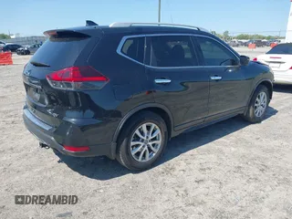 2018 Nissan Rogue SV with VIN 5N1AT2MT1JC818893, listed as a IAAI auction lot 41982981 with 136,443 mi miles and . Bid and sale history available at carsss.com. Image 4.