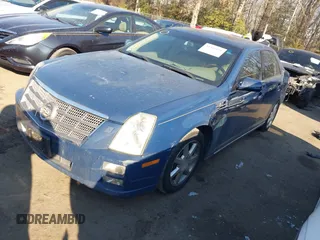 2009 Cadillac STS AWD w/1SB with VIN 1G6DD67VX90130281, listed as a IAAI auction lot 41384191 with 102,943 mi miles. Bid and sale history available at carsss.com. Image 2.