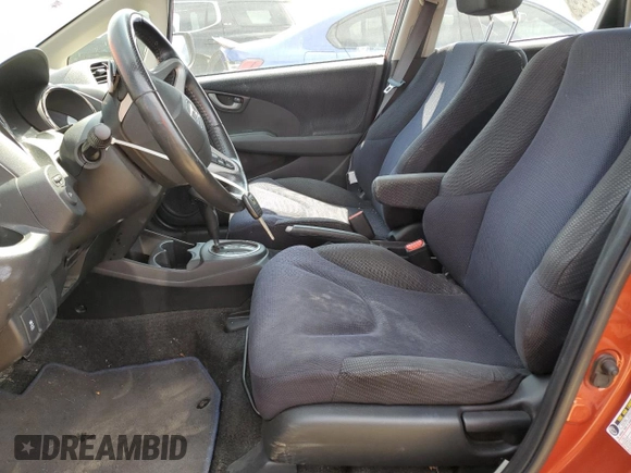2012 Honda Fit Sport with VIN JHMGE8H54CC019571, listed as a Copart auction lot 56138305 with 52,504 mi miles and Clean Title. Bid and sale history available at DreamBid. Image 7.