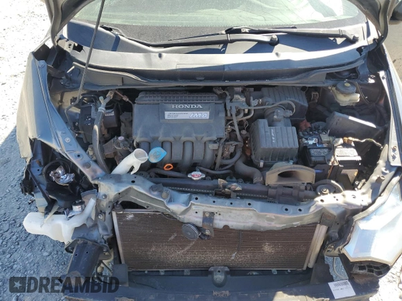2012 Honda Insight EX z VIN JHMZE2H76CS001683, wystawiony jako Copart lot #49061885 z przebiegiem 259 158 mil mil oraz Szkoda całkowita • Salvage title. Historia ofert i sprzedaży dostępna na DreamBid. Obrazek 11.