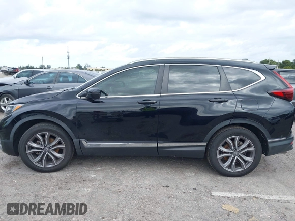 2021 Honda CR-V Touring with VIN 2HKRW1H91MH410751, listed as a IAAI auction lot 41286168 with 56,314 mi miles. Bid and sale history available at carsss.com. Image 14.