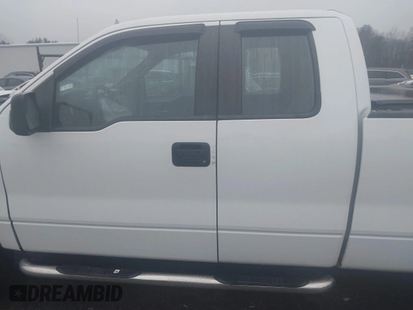 2013 Ford F-150 XL with VIN 1FTEX1EM0DFA08072, listed as a IAAI auction lot 41201636 with 105,745 mi miles and . Bid and sale history available at DreamBid. Image 14.