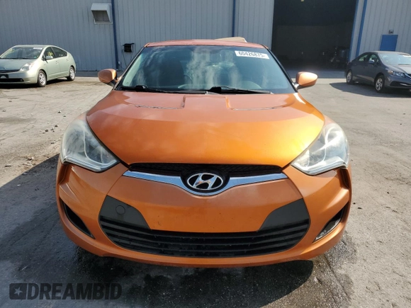 2013 Hyundai Veloster w/Gray Int z VIN KMHTC6AD1DU103219, wystawiony jako Copart lot #60426875 z przebiegiem 135 869 mil mil oraz Szkoda całkowita • Salvage title. Historia ofert i sprzedaży dostępna na DreamBid. Obrazek 5.