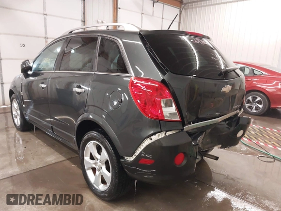 2015 Chevrolet Captiva Sport LTZ with VIN 3GNAL4EK2FS530864, listed as a IAAI auction lot 41585277 with 136,873 mi miles and . Bid and sale history available at DreamBid. Image 3.