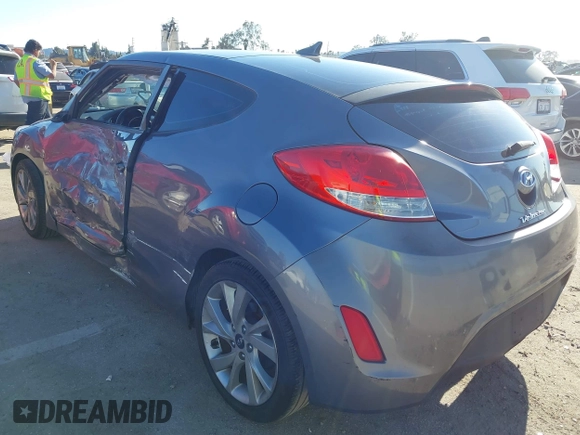2016 Hyundai Veloster with VIN KMHTC6AD3GU283985, listed as a IAAI auction lot 41872103 with 153,949 mi miles. Bid and sale history available at carsss.com. Image 3.