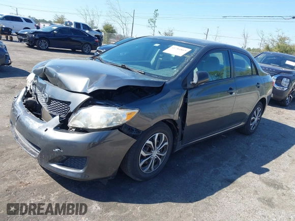 2010 Toyota Corolla with VIN 2T1BU4EE0AC371711, listed as a IAAI auction lot 41784869 with 82,999 mi miles. Bid and sale history available at carsss.com. Image 17.