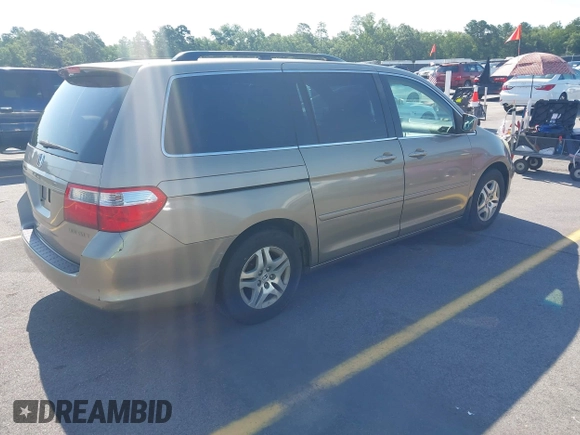2005 Honda Odyssey EX-L z VIN 5FNRL38735B111376, wystawiony jako IAAI lot #42378824 z przebiegiem 191 632 mil mil oraz . Historia ofert i sprzedaży dostępna na DreamBid. Obrazek 4.