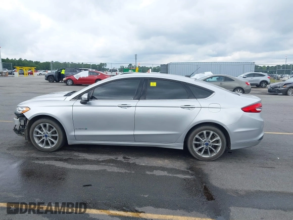 2017 Ford Fusion Hybrid SE with VIN 3FA6P0LU2HR317784, listed as a IAAI auction lot 42618554 with 114,814 mi miles and . Bid and sale history available at DreamBid. Image 15.
