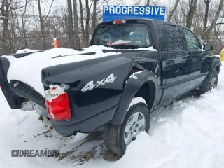 2005 Dodge Dakota SLT with VIN 1D7HW48N55S271727, listed as a IAAI auction lot 41249537 with 196,500 mi miles. Bid and sale history available at carsss.com. Image 4.