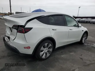 2021 Tesla Model Y Long Range with VIN 5YJYGDEEXMF151686, listed as a Copart auction lot 53903115 with 65,321 mi miles and Salvage Title. Bid and sale history available at DreamBid. Image 3.