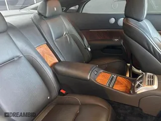 2015 Rolls-Royce Wraith with VIN SCA665C52FUX85482, listed as a Copart auction lot 77887554 with 99,781 mi miles and Salvage Title. Bid and sale history available at carsss.com. Image 6.