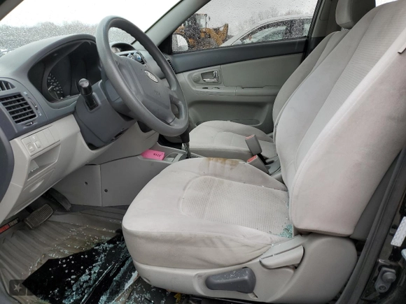 2009 Kia Spectra EX with VIN KNAFE222795620282, listed as a Copart auction lot 53187425 with 0 mi miles and Salvage Title. Bid and sale history available at carsss.com. Image 7.