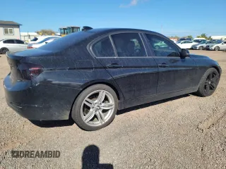 2015 BMW 3 Series 328i with VIN WBA3A5C57FP605063, listed as a Copart auction lot 54818934 with 148,500 mi miles and Clean Title. Bid and sale history available at carsss.com. Image 3.