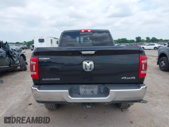 2022 Ram 2500 Laramie with VIN 3C6UR5FJ2NG305658, listed as a IAAI auction lot 42362662 with 50,701 mi miles and . Bid and sale history available at DreamBid. Image 16.