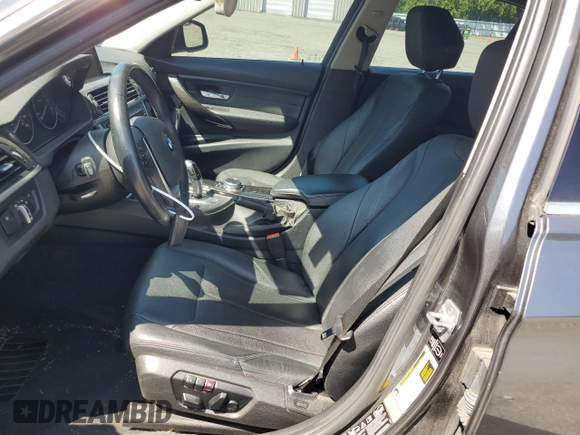 2015 BMW 3 Series 328i xDrive with VIN WBA3B3C5XFJ985147, listed as a Copart auction lot 59819905 with 113,492 mi miles and Salvage title. Bid and sale history available at DreamBid. Image 7.