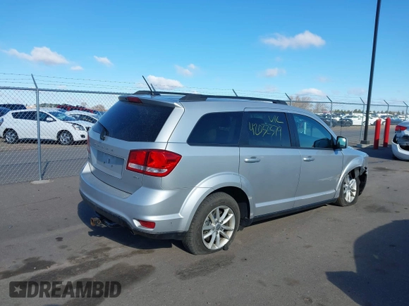 2013 Dodge Journey SXT with VIN 3C4PDDBG4DT506900, listed as a IAAI auction lot 42032379 with 130,911 mi miles and . Bid and sale history available at DreamBid. Image 4.