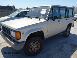 1990 Isuzu Trooper с VIN JACCH58R4L8907425, выставлен на аукционе IAAI как лот 42504278 с пробегом 196 138 миль миль и . История ставок и продаж доступна на DreamBid. Изображение 2.