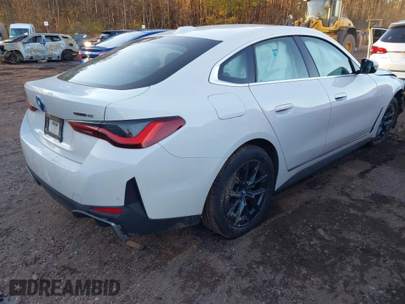 2023 BMW i4 eDrive40 z VIN WBY73AW07PFP43618, wystawiony jako IAAI lot #41366523 z przebiegiem Nie podano mil oraz . Historia ofert i sprzedaży dostępna na DreamBid. Obrazek 4.