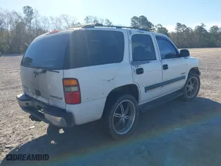 2003 Chevrolet Tahoe LS with VIN 1GNEC13V23J329623, listed as a IAAI auction lot 41885652 with 277,112 mi miles. Bid and sale history available at carsss.com. Image 4.