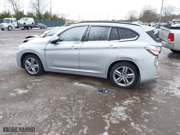 2016 BMW X1 xDrive28i with VIN WBXHT3C3XG5E51358, listed as a IAAI auction lot 41730597 with 90,010 mi miles. Bid and sale history available at carsss.com. Image 14.