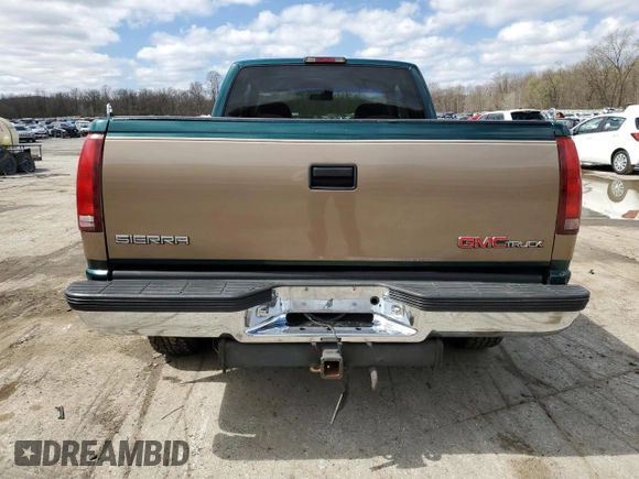 1995 GMC Sierra 1500 z VIN 2GTEK19K3S1511767, wystawiony jako Copart lot #51977295 z przebiegiem 215 667 mil mil oraz Szkody całkowita. Historia ofert i sprzedaży dostępna na DreamBid. Obrazek 6.