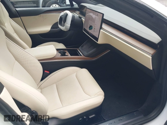 2021 Tesla Model S Plaid z VIN 5YJSA1E62MF452838, wystawiony jako IAAI lot #42726183 z przebiegiem 21 725 mil mil oraz . Historia ofert i sprzedaży dostępna na DreamBid. Obrazek 5.