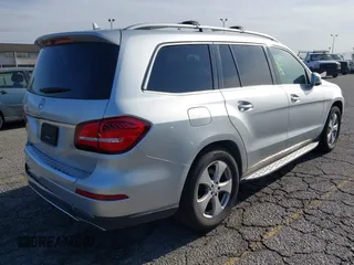 2017 Mercedes-Benz GLS 450 z VIN 4JGDF6EE7HA821525, wystawiony jako IAAI lot #41977324 z przebiegiem 110 557 mil mil oraz . Historia ofert i sprzedaży dostępna na DreamBid. Obrazek 4.