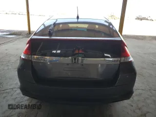 2012 Honda Insight z VIN JHMZE2H38CS004159, wystawiony jako Copart lot #60316925 z przebiegiem 142 601 mil mil oraz Szkoda całkowita • Salvage title. Historia ofert i sprzedaży dostępna na DreamBid. Obrazek 6.