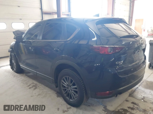 2020 Mazda CX-5 Touring with VIN JM3KFBCM6L0739077, listed as a IAAI auction lot 41810946 with 82,911 mi miles and . Bid and sale history available at carsss.com. Image 3.
