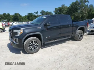 2022 GMC Sierra 1500 AT4 with VIN 1GTP9EEL8NZ153989, listed as a Copart auction lot 63143675 with 59,214 mi miles and Salvage title. Bid and sale history available at DreamBid. Image 1.