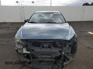 2016 Mazda 3 i Touring with VIN JM1BM1W71G1285237, listed as a Copart auction lot 71208844 with 94,534 mi miles and Salvage Title. Bid and sale history available at DreamBid. Image 5.