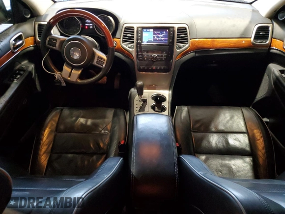 2013 Jeep Grand Cherokee Overland with VIN 1C4RJFCT5DC599866, listed as a Copart auction lot 51837395 with 105,521 mi miles and Salvage Title. Bid and sale history available at carsss.com. Image 8.
