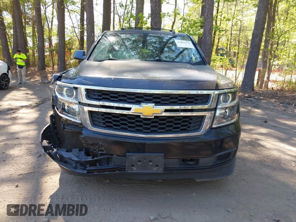 2015 Chevrolet Suburban LT with VIN 1GNSCJKC1FR264255, listed as a IAAI auction lot 42065176 with 115,861 mi miles. Bid and sale history available at carsss.com. Image 12.