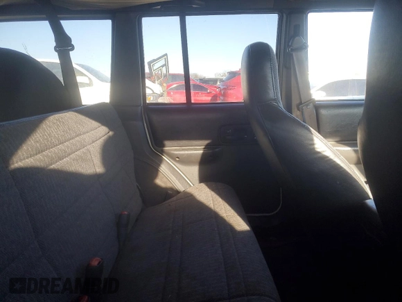 2001 Jeep Cherokee Sport z VIN 1J4FF48S71L532376, wystawiony jako Copart lot #81408644 z przebiegiem 230 058 mil mil oraz Szkoda całkowita • Salvage title. Historia ofert i sprzedaży dostępna na DreamBid. Obrazek 10.