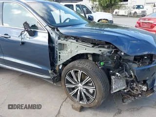 2021 Volvo XC60 Inscription Expression with VIN YV4BR0DL5M1820896, listed as a IAAI auction lot 42207370 with 58,670 mi miles and . Bid and sale history available at DreamBid. Image 6.
