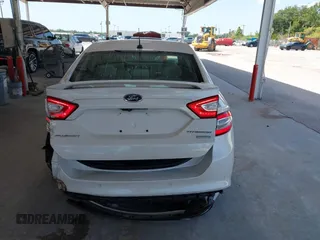 2016 Ford Fusion Titanium with VIN 3FA6P0K96GR390989, listed as a IAAI auction lot 42634275 with 123,559 mi miles and . Bid and sale history available at DreamBid. Image 16.
