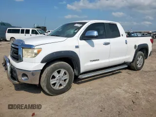 2010 Toyota Tundra z VIN 5TFRM5F10AX007032, wystawiony jako Copart lot #57122285 z przebiegiem 169 049 mil mil oraz Szkoda całkowita • Salvage title. Historia ofert i sprzedaży dostępna na DreamBid. Obrazek 1.