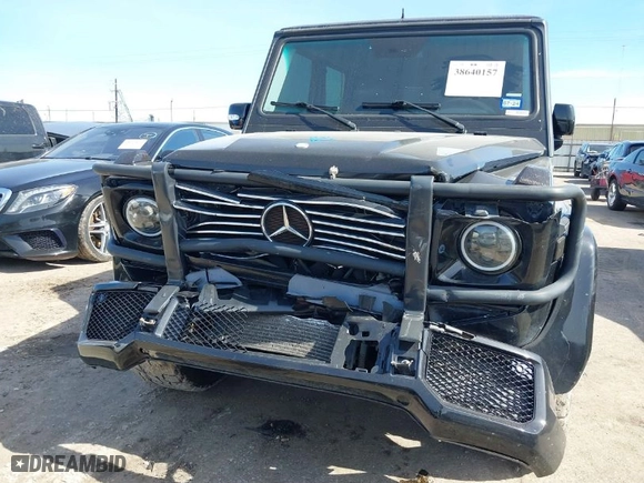 2005 Mercedes-Benz G-Class with VIN WDCYR49E25X156547, listed as a IAAI auction lot 38640157 with 241,209 mi miles. Bid and sale history available at carsss.com. Image 6.