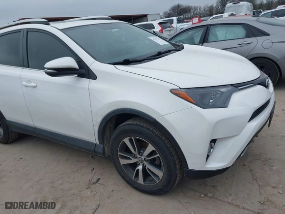 2016 Toyota RAV4 XLE with VIN 2T3WFREV8GW259777, listed as a IAAI auction lot 41241266 with 129,122 mi miles. Bid and sale history available at carsss.com. Image 1.