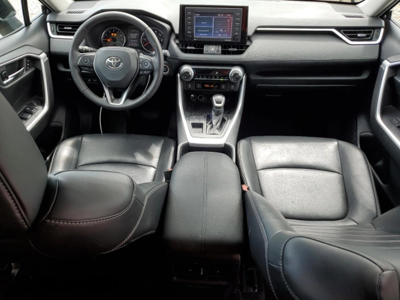 2021 Toyota RAV4 XLE Premium with VIN 2T3C1RFV9MC109917, listed as a Copart auction lot 58594335 with 64,995 mi miles and Salvage title. Bid and sale history available at DreamBid. Image 8.