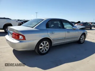 2005 Kia Optima LX z VIN KNAGD128055433689, wystawiony jako Copart lot #46909305 z przebiegiem 27 609 mil mil oraz Szkoda całkowita • Salvage title. Historia ofert i sprzedaży dostępna na DreamBid. Obrazek 3.