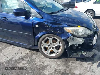 2009 Mazda 5 Sport with VIN JM1CR29L390355978, listed as a IAAI auction lot 41609117 with 118,588 mi miles and . Bid and sale history available at DreamBid. Image 6.