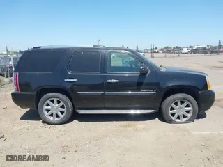2008 GMC Yukon Denali with VIN 1GKFK63848J210877, listed as a IAAI auction lot 42096972 with 144,467 mi miles. Bid and sale history available at carsss.com. Image 14.