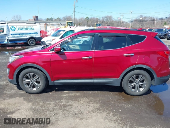 2014 Hyundai Santa Fe z VIN 5XYZUDLB3EG226857, wystawiony jako IAAI lot #41917762 z przebiegiem 42 677 mil mil oraz . Historia ofert i sprzedaży dostępna na DreamBid. Obrazek 14.