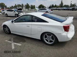 2004 Toyota Celica GT with VIN JTDDR32TX40174017, listed as a Copart auction lot 73748694 with 138,701 mi miles and Salvage Title. Bid and sale history available at DreamBid. Image 2.