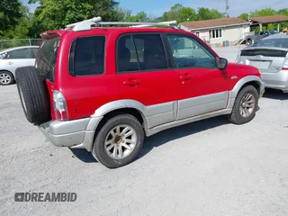 2005 Suzuki Grand Vitara LX z VIN JS3TD62VX54201211, wystawiony jako IAAI lot #42220221 z przebiegiem 242 165 mil mil oraz . Historia ofert i sprzedaży dostępna na DreamBid. Obrazek 4.